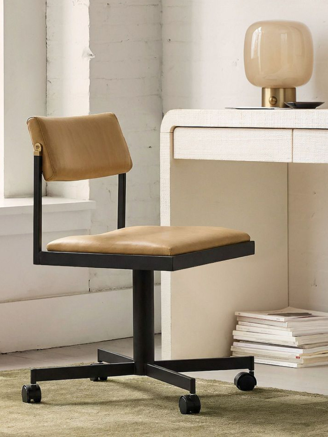 A leather office chair from West Elm