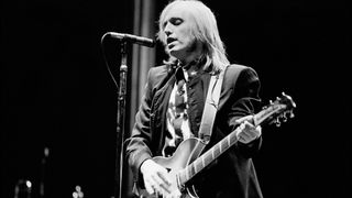 Tom Petty plays a Rickenbacker guitar with the Heartbreakers on the 'Southern Accents' tour at Brendan Byrne Arena (later known as Meadowlands Arena), East Rutherford, New Jersey, June 15, 1985.