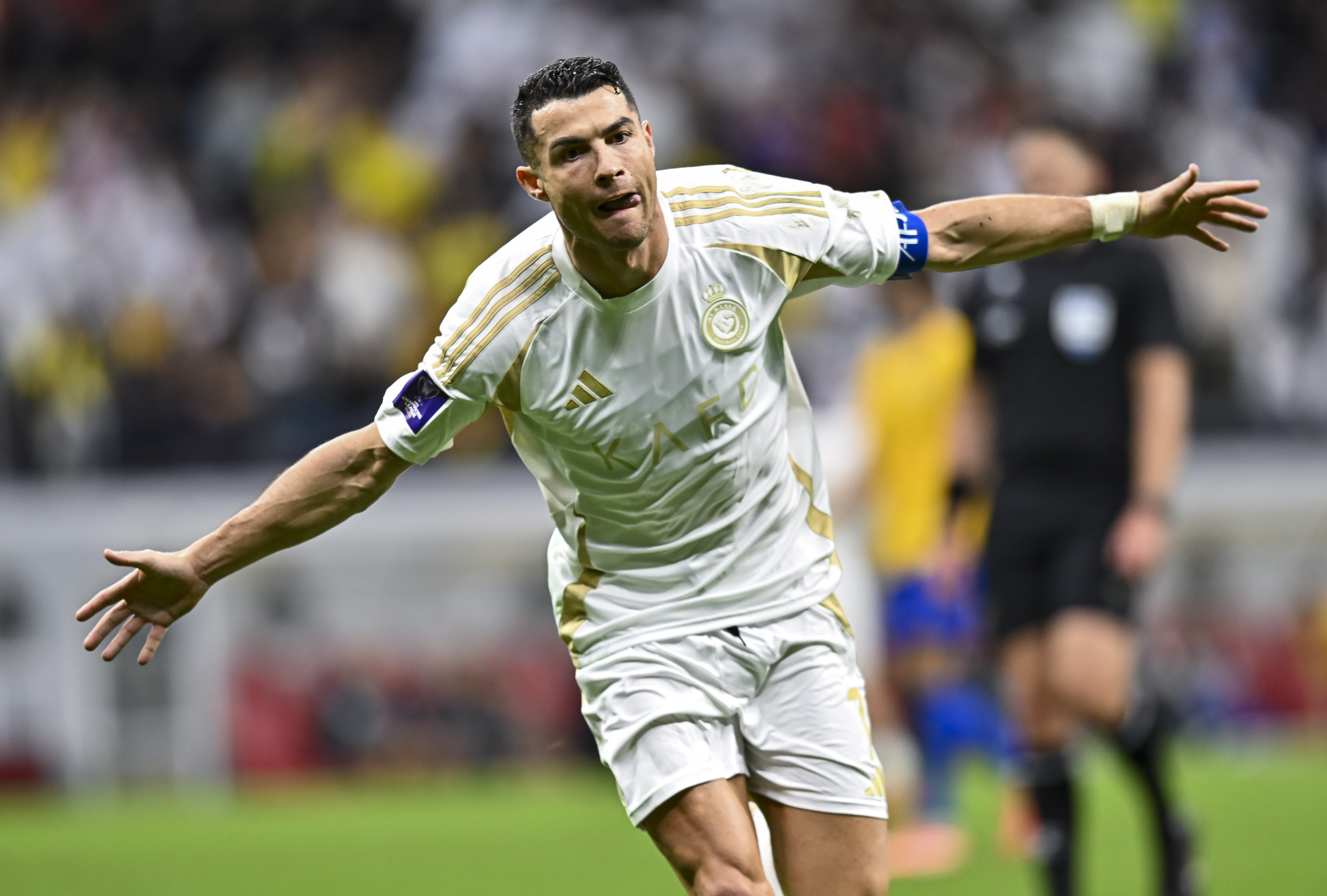 Cristiano Ronaldo celebrates a goal for Al-Nassr against Al-Gharafa in November 2024.