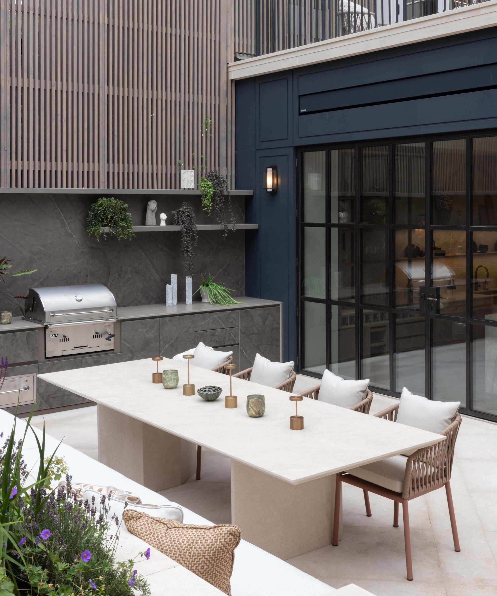 outdoor kitchen with dining table