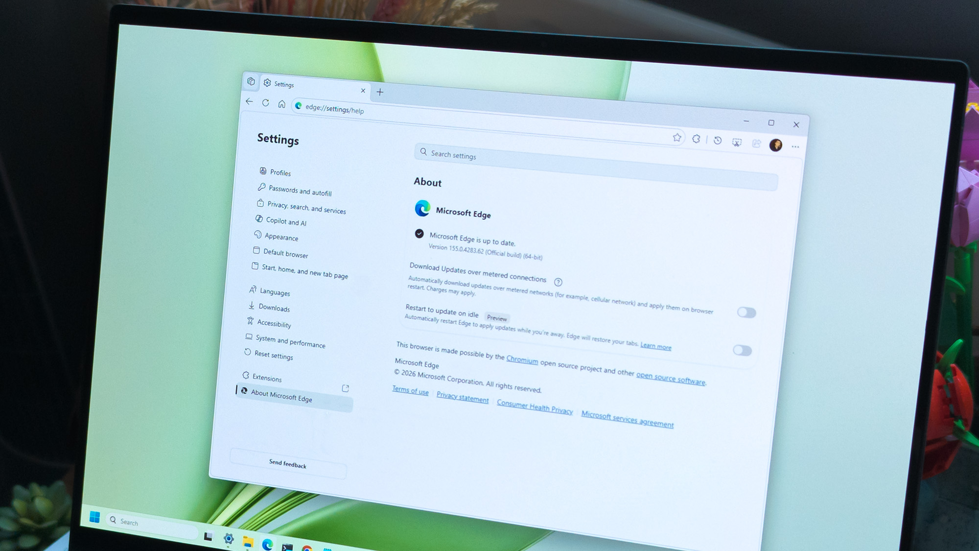 Microsoft Edge version number displayed within the browser on Windows 11 with a green desktop wallpaper