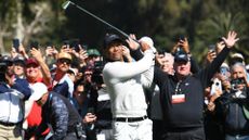 Tiger Woods hits a shot during the first round of the Genesis Invitational on February 15, 2024, at Riviera Country Club.