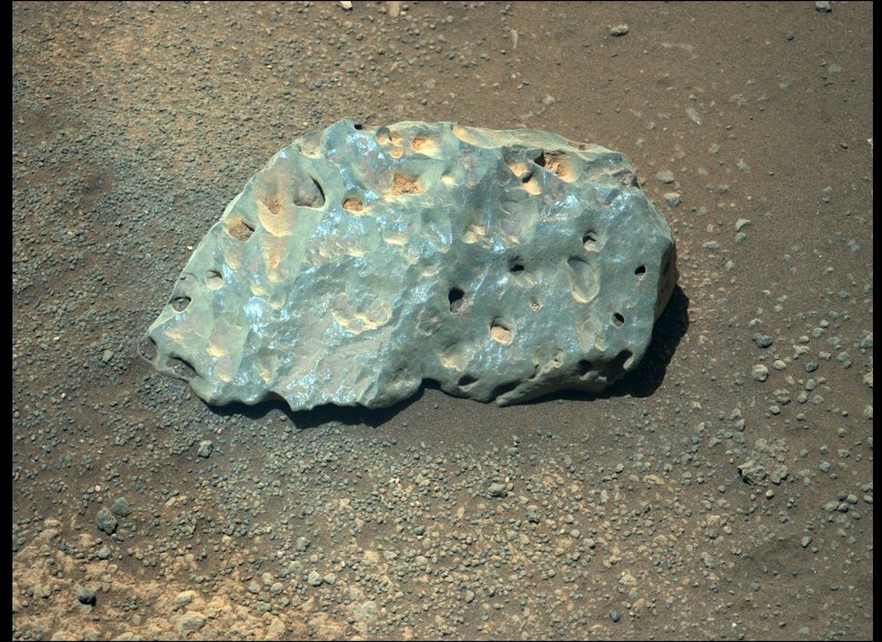 What's up with this weird green rock on Mars? Perseverance rover is trying to find out.