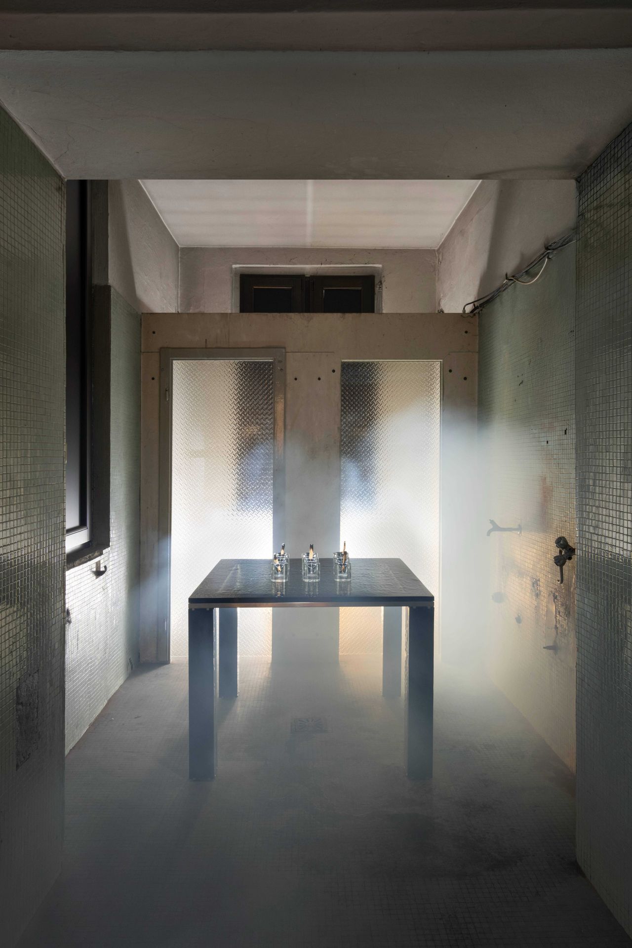 Murano glass lighting installed in a former swimming pool