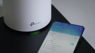 TP-Link Deco X60 with app open