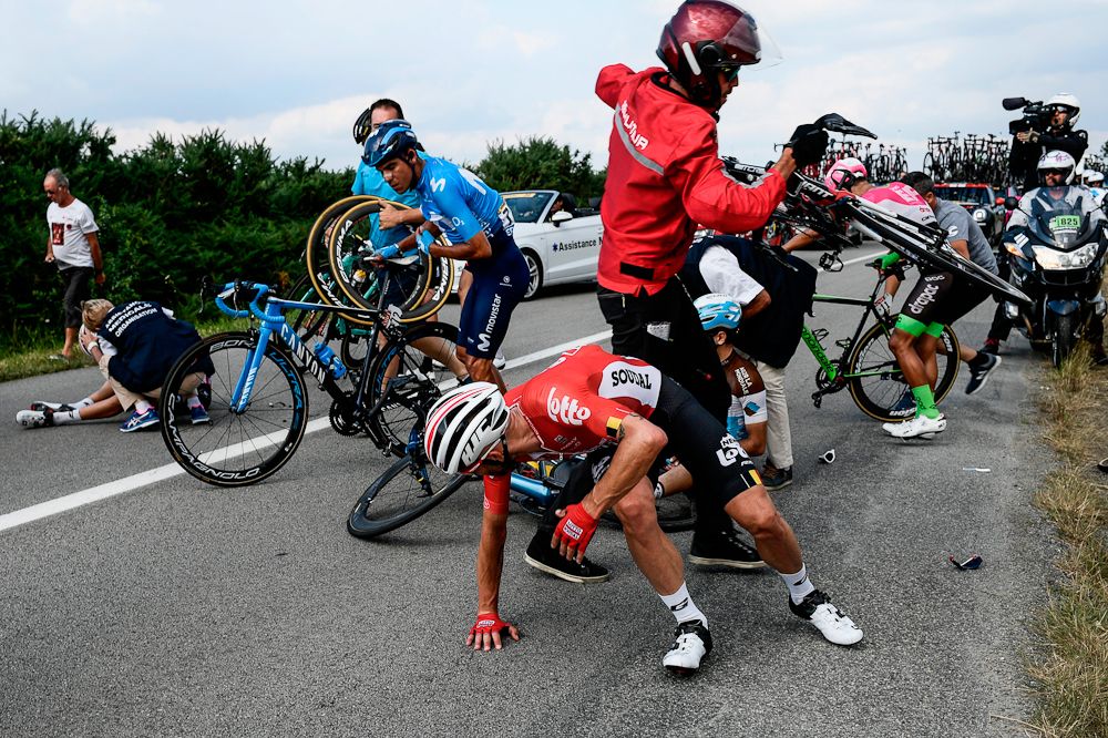 Tomasz Marczynski is caught up in a crash near the end of stage 4