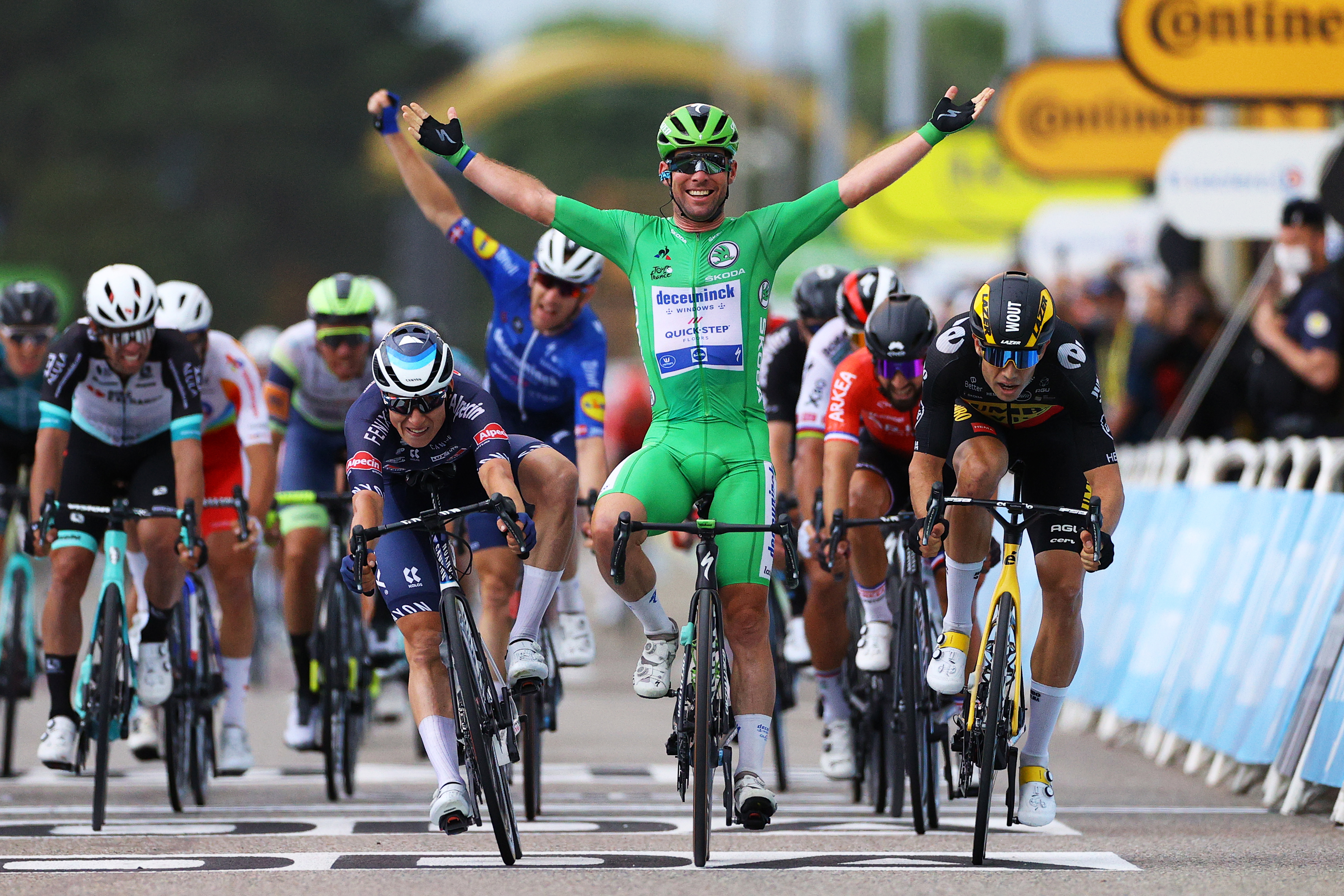 VALENCE, FRANCE - JULY 06: Mark Cavendish of The United Kingdom and Team Deceuninck - Quick-Step Green Points Jersey Green Points Jersey stage winner celebrates at arrival, Wout Van Aert of Belgium and Team Jumbo-Visma & Jasper Philipsen of Belgium and Team Alpecin-Fenix during the 108th Tour de France 2021, Stage 10 a 190,7km stage from Albertville to Valence / @LeTour / #TDF2021 / on July 06, 2021 in Valence, France. (Photo by Tim de Waele/Getty Images)