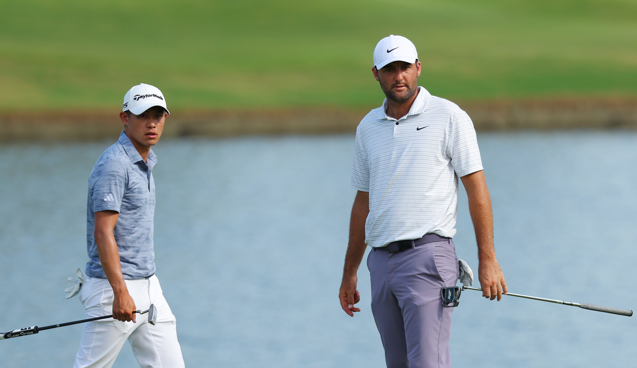 Collin Morikawa and Scottie Scheffler shake hands on the 18th green at Augusta National