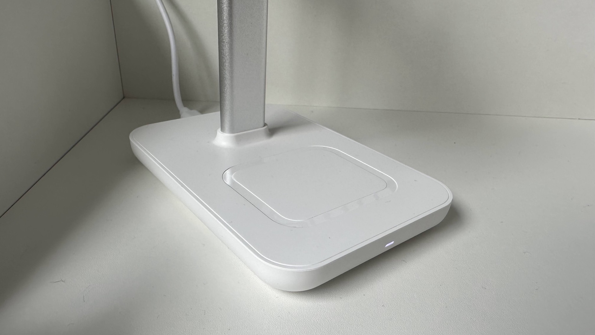 The Journey Rapid Trio 3-in-1 Wireless Charging Station on a bedside table