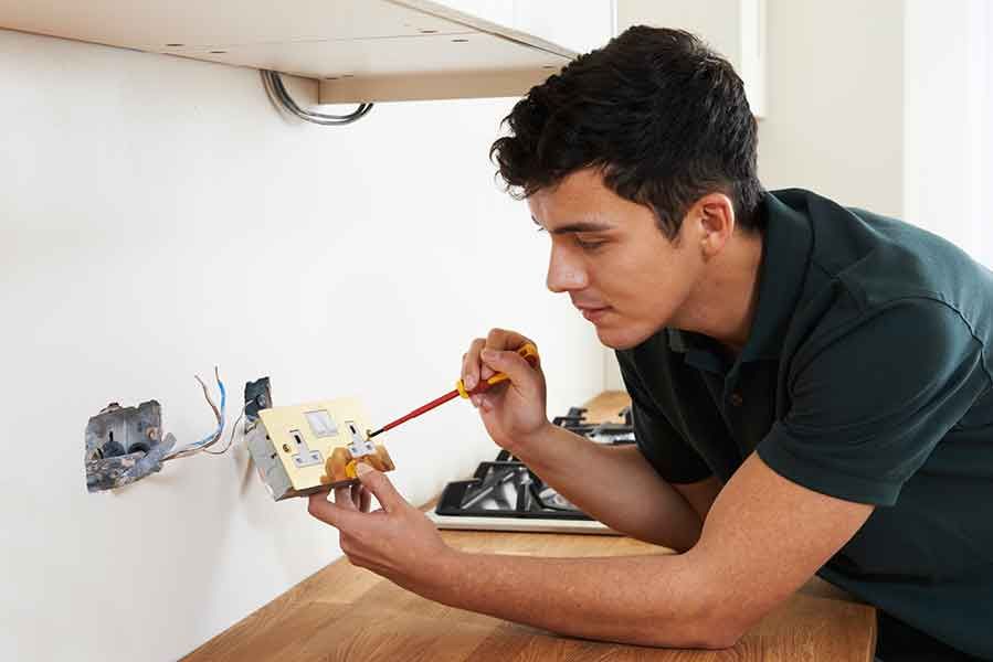 electrician with plug socket