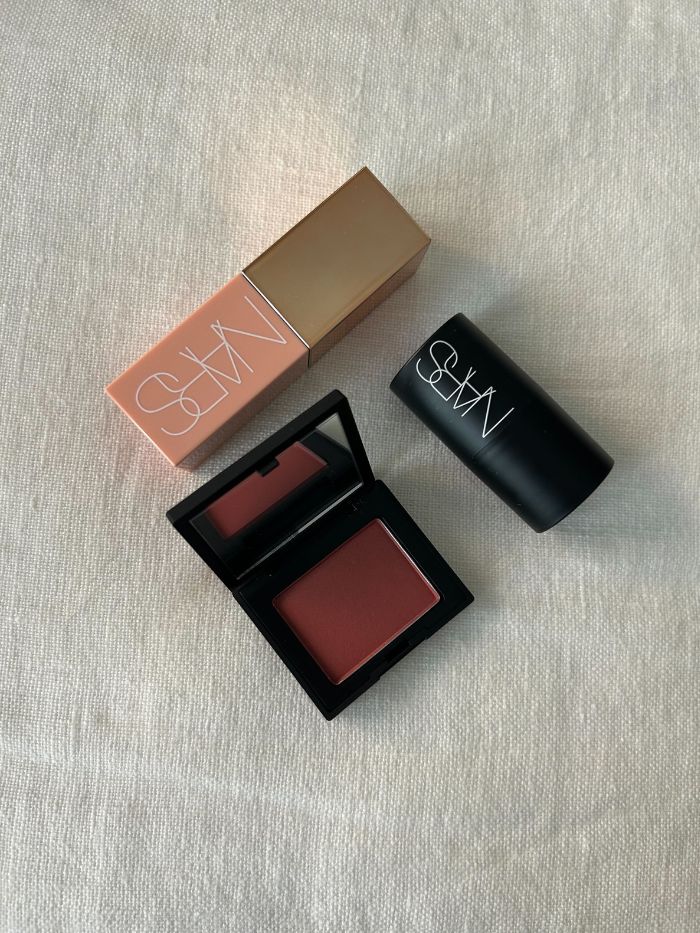 The Nars Christmas 2025 Cheek Set on a white linen background