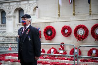 Remembrance Sunday, veterans and members of the public attend The Cenotaph to pay their respects following the earlier Service of Remembrance