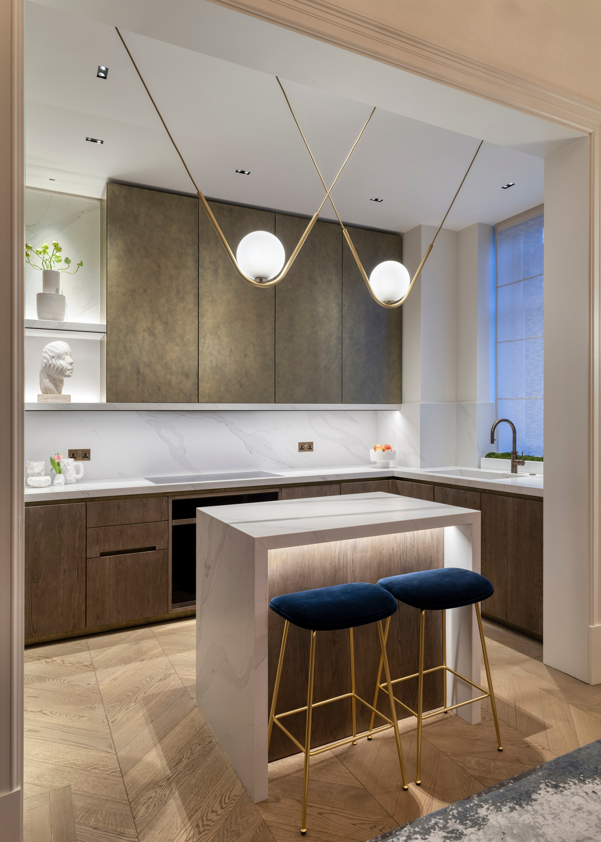 small kitchen with hanging pendant lights and led under cabinet lighting