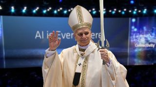 Pope Leo holds a photoshopped sword atop a slightly blurry image of an AMD AI presentation.