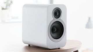 Q Acoustics 3020i speaker in white finish on table top