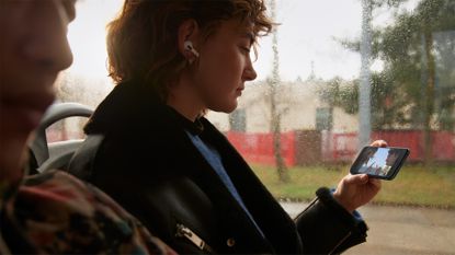 Woman using iPhone SE 2022