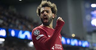 Liverpool star Mohamed Salah celebrates scoring his third goal during the UEFA Champions League group A match between Rangers FC and Liverpool FC at Ibrox Stadium on October 12, 2022 in Glasgow, United Kingdom.