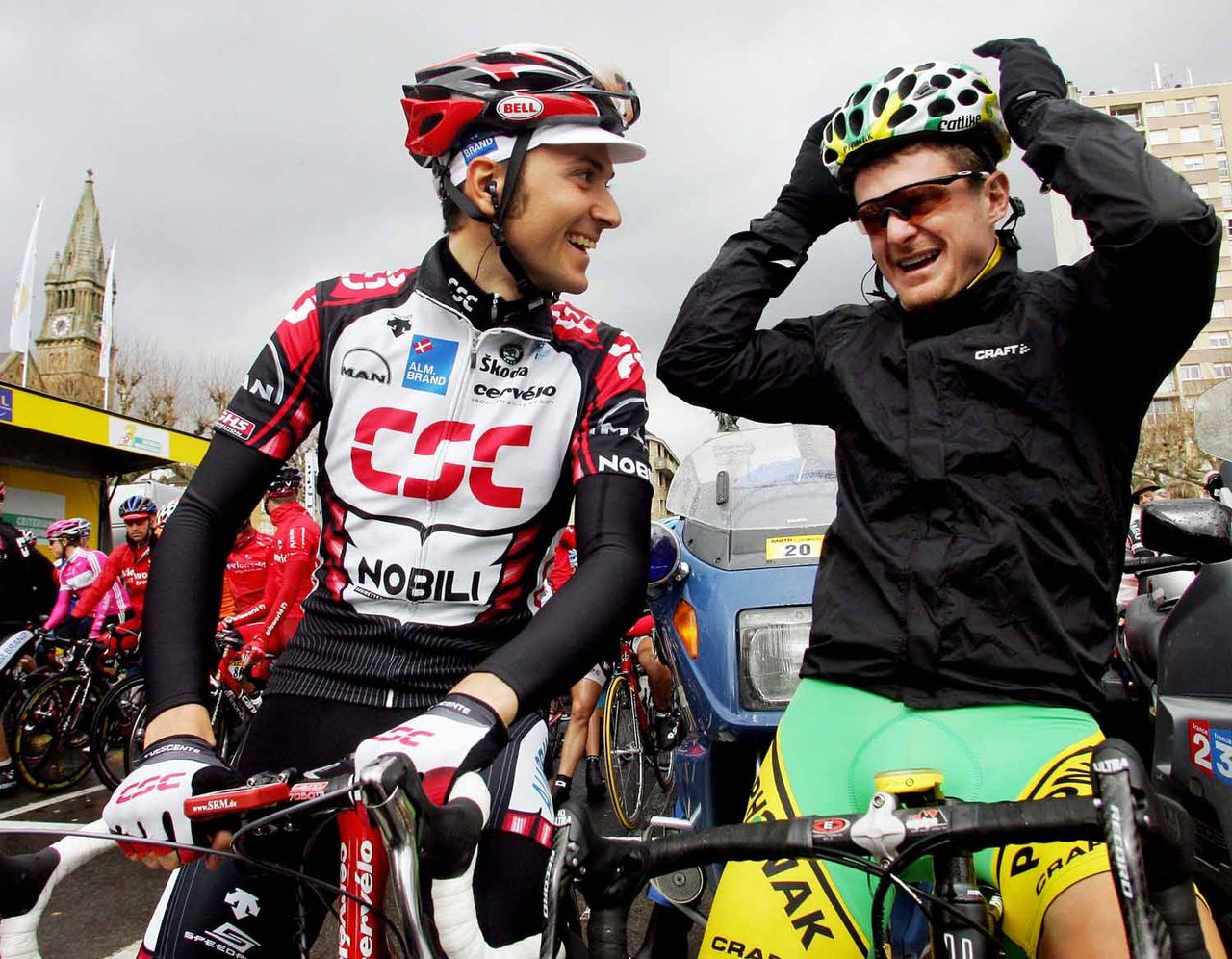 Tour de France favourites Ivan Basso and Floyd Landis in conversation at Criterium International in 2006.