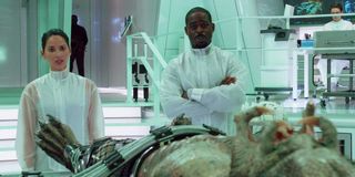 Oliva Munn and Sterling K. Brown in The Predator