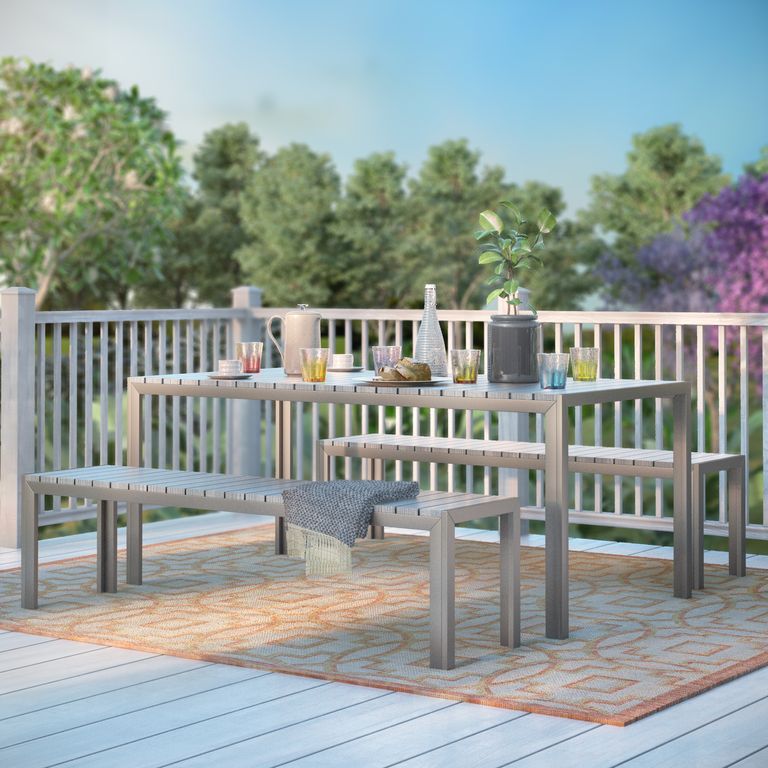Wayfair sale: dining table and bench set on a balcony 