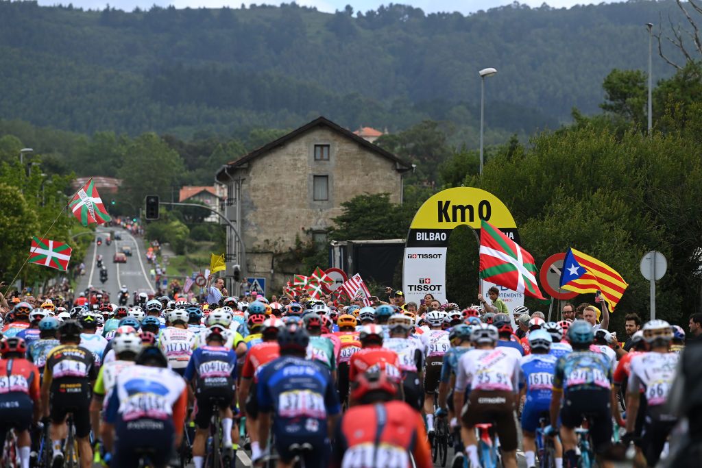 BILBAO SPAIN JULY 01 A general view of the peloton passing through Km 0 at start during the stage one of the 110th Tour de France 2023 a 182km stage from Bilbao to Bilbao UCIWT on July 01 2023 in Bilbao Spain Photo by Tim de WaeleGetty Images