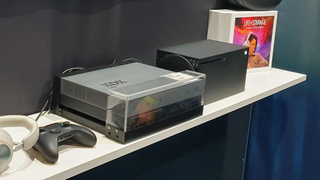 Photograph of an Xbox Series X XDK dev kit alongside the original Series X. The new XDK likely looks different!