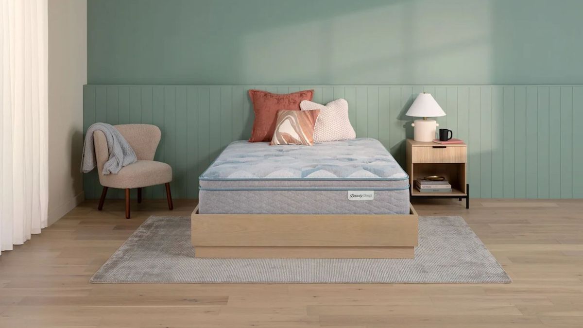 The Beauty Sleep 14.25 Ultra Plush Pillow Top mattress in a sunny bedroom