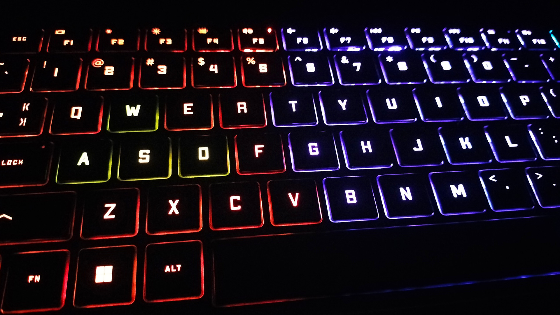 HP Omen 16 keyboard glowing at night