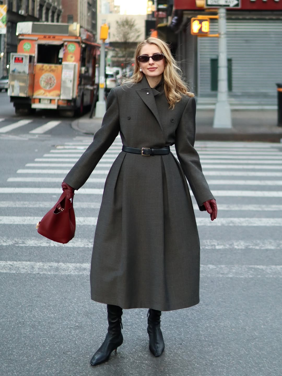 woman wearing statement coat outfit 2026