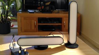 Two Philips Hue Play Light Bars on table, switched off