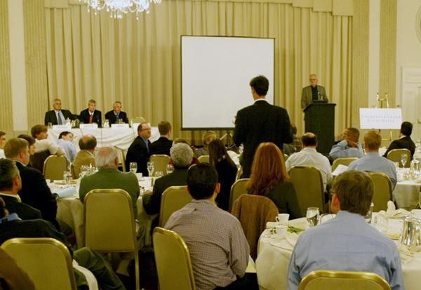 Lester Munson of ESPN moderates as a Chicago Bar Association member