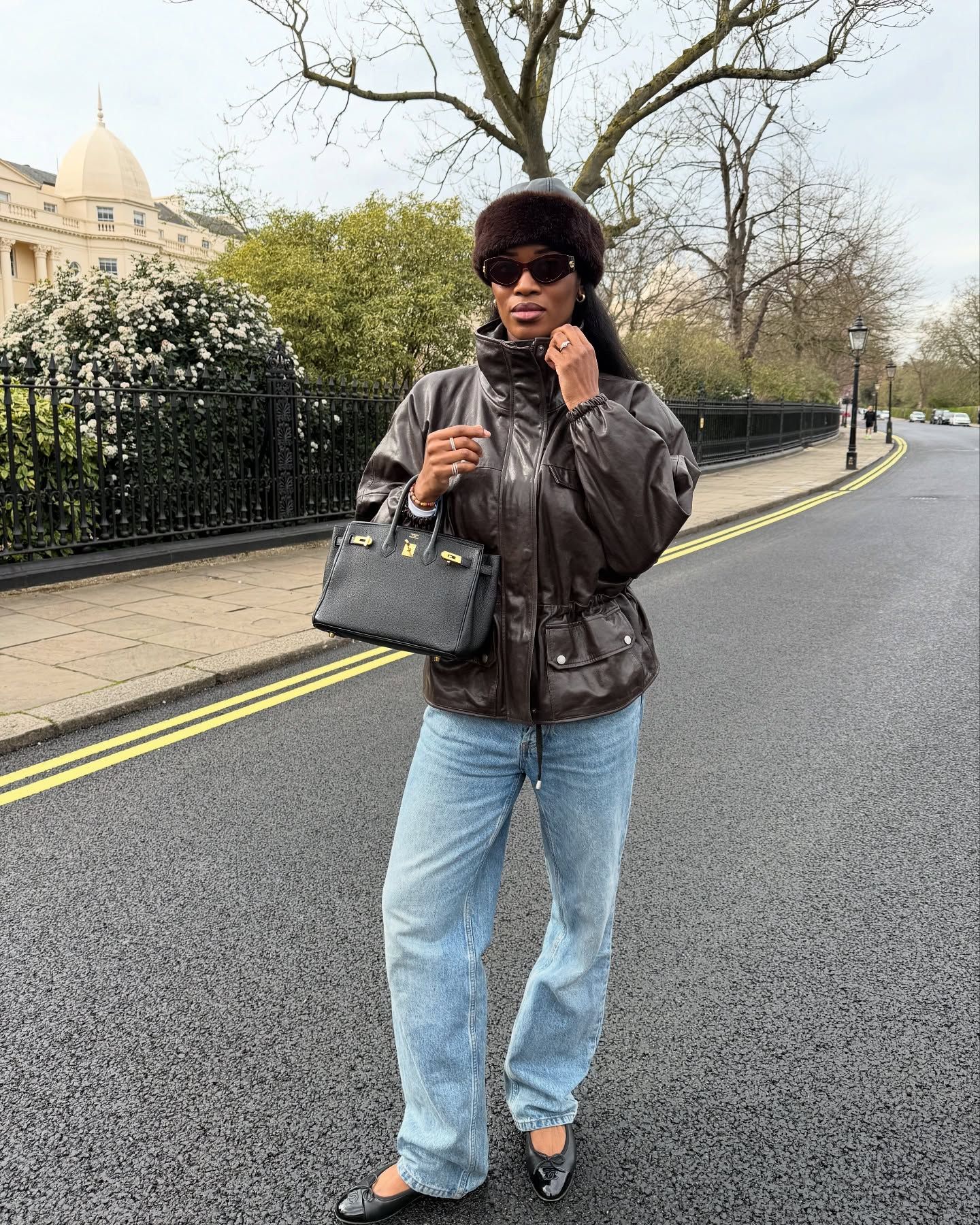 Woman wearing tailored wide-leg jeans.