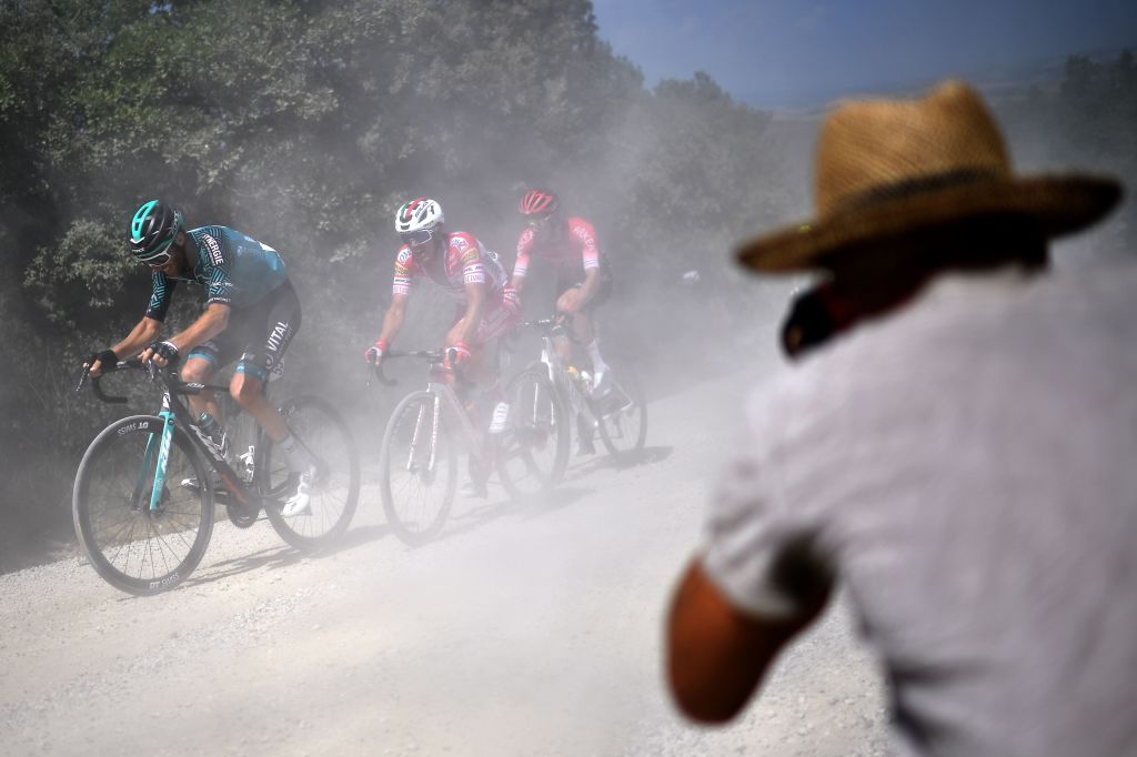 BVC team French rider Quentin Pacher leads the break away through the countryside during the oneday classic cycling race Strade Bianche White Roads on August 1 2020 around Siena Tuscany Photo by Marco Bertorello AFP Photo by MARCO BERTORELLOAFP via Getty Images