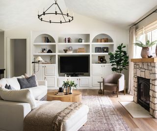 Living room with a neutral color palette and furniture with statement wooden legs