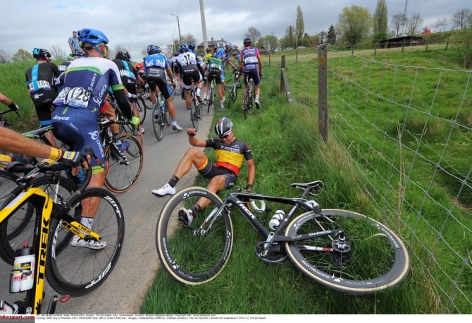 Stijn Devolder (Trek) attempts to get back on his bike after a crash