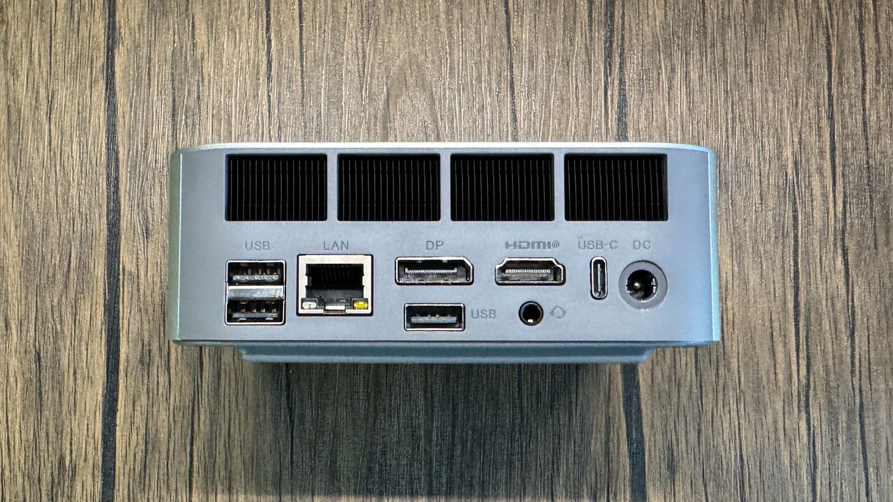 Beelink SER9 Mini PC on a wood background