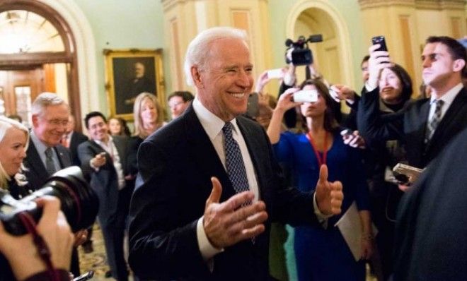 Vice President Joe Biden arrives for a meeting with Senate Democrats to urge them to support a fiscal cliff deal. The Senate later passed the deal 89-8.