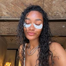 Cheyenne Maya Carty with wet, post-shower hair and eye patches on.