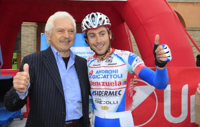 A happy Androni Giocattoli manager Gianni Savio with stage 1a winner Fabio Felline