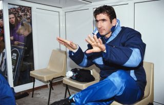 Eric Cantona calms the media down ahead of his debut for Leeds United against Oldham Athletic in February 1992.