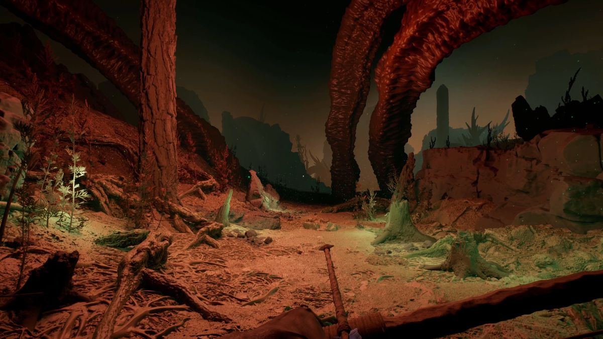 view of a dank, dark swamp with path leading out into the muck, overhanging bones