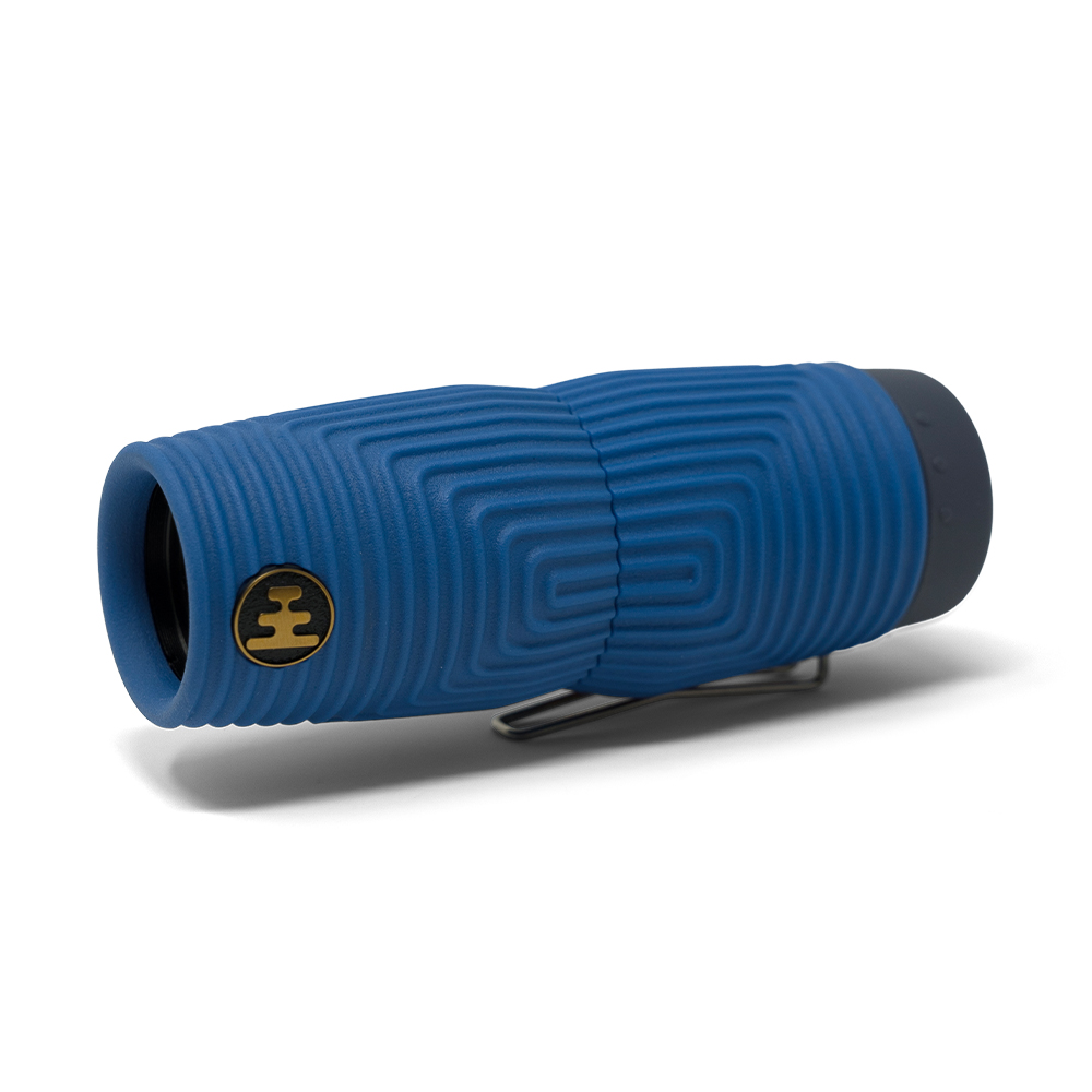 A blue Zero Tube monocular