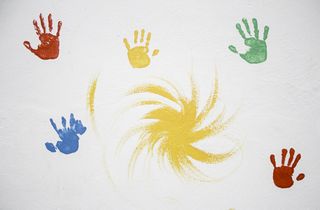 image of painted handprints