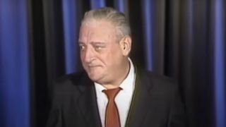 Rodney Dangerfield performing stand-up