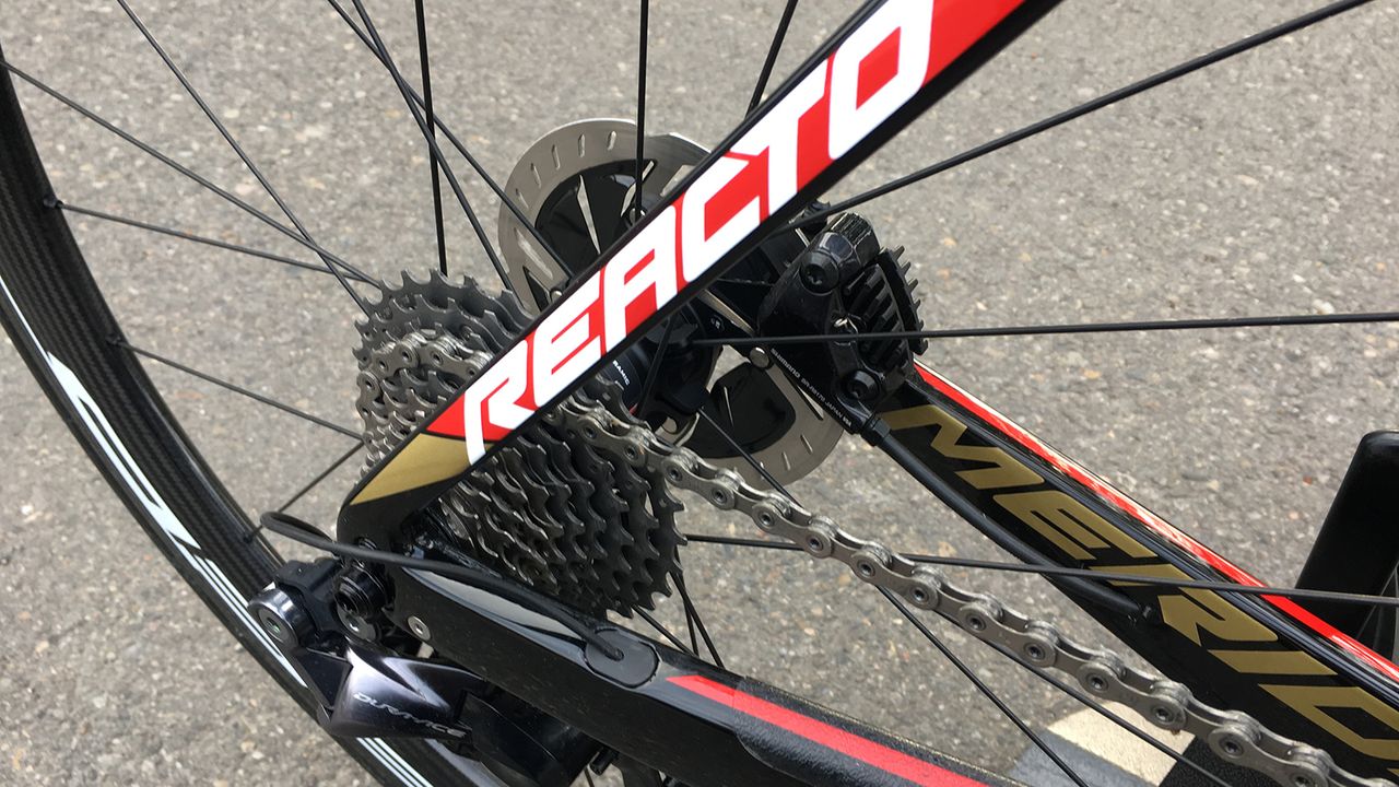 The black base colour of the frame is overlaid with white, red and gold decals