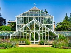 An exterior view of a beautiful greenhouse in a botanical garden