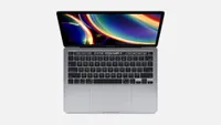 MacBook Pro (13-inch, 2020) with the screen open and displaying the keyboard and trackpad