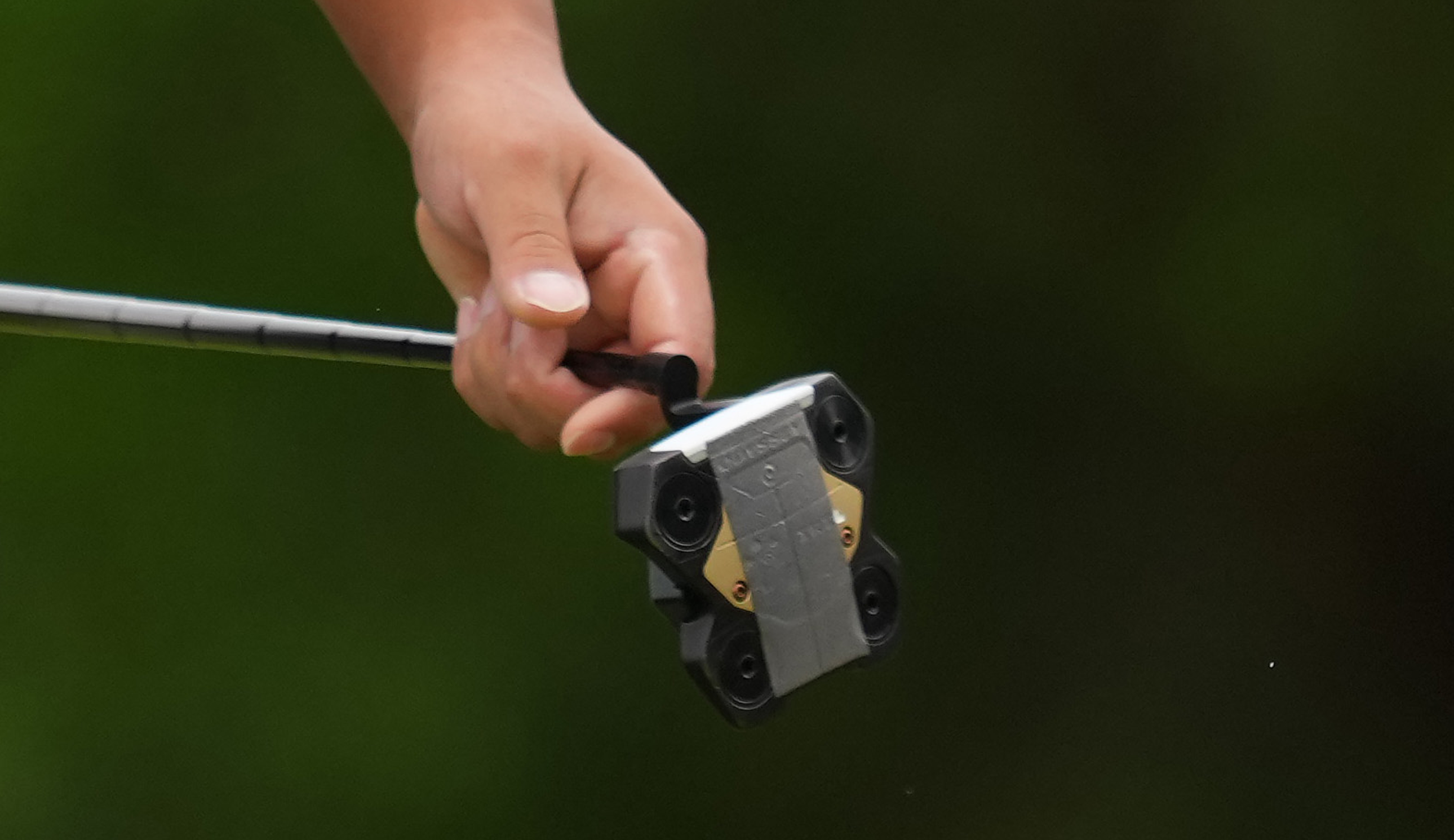 A close-up of Si Woo Kim's putter