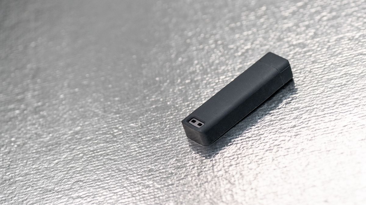 Seagate Ultra Compact SSD on a glass background.