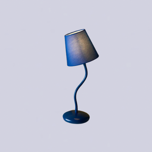 A blue table lamp with a wavy base